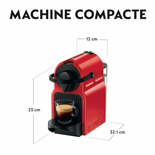 Machine à café compacte rouge avec tasse.