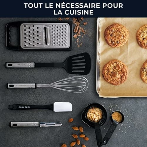 Ustensiles de cuisine et biscuits sur une table
